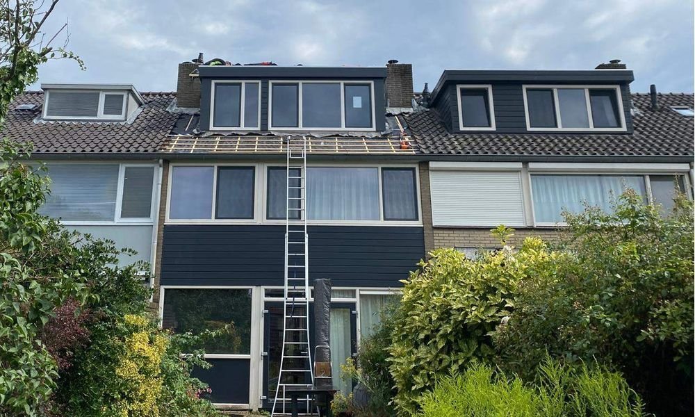 Wat kost een plat dak herstellen in Uden?